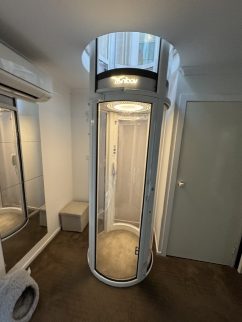 Vacuum home elevator in hallway